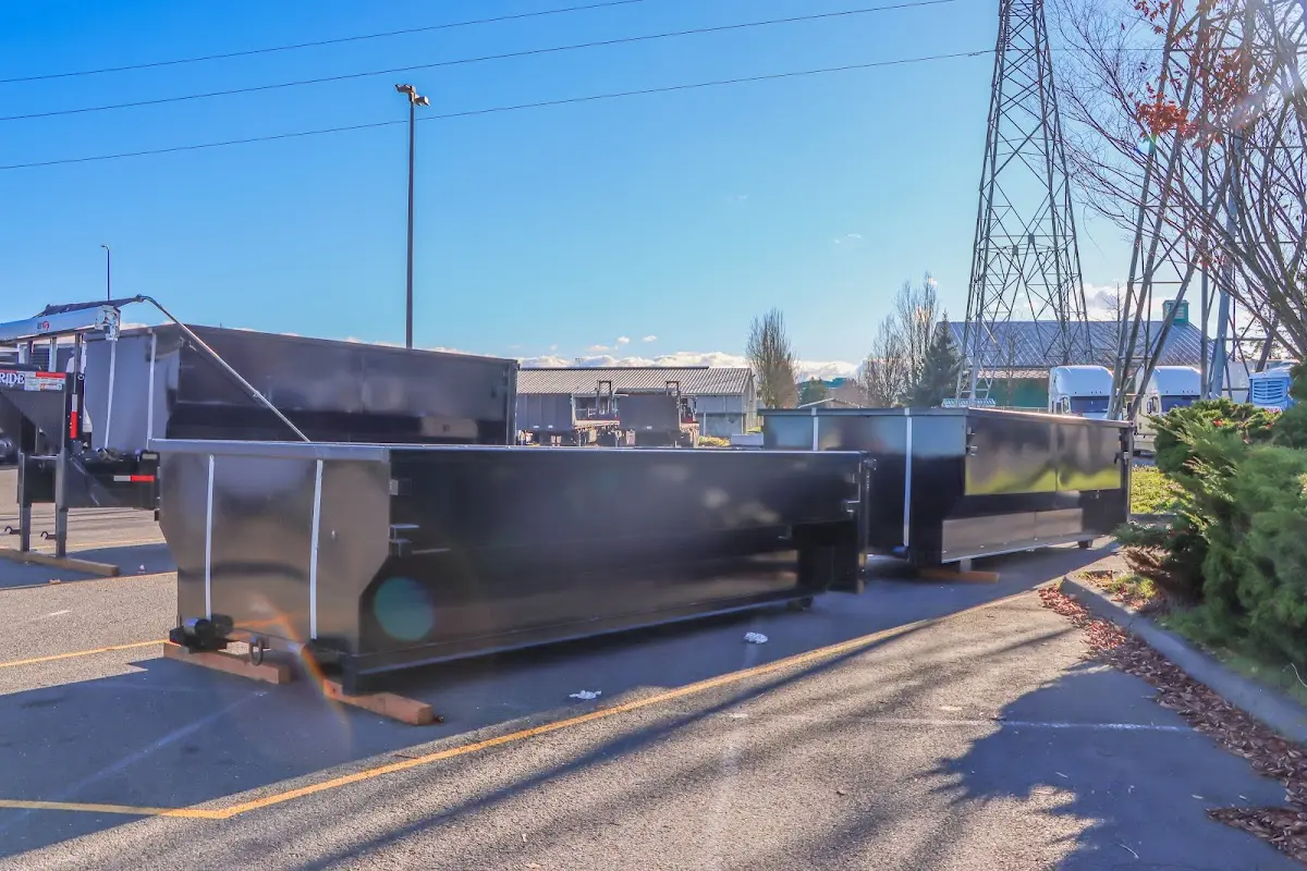 Roll-off dumpster ready for waste disposal at job site for Construction Dumpster Rental in Lansing